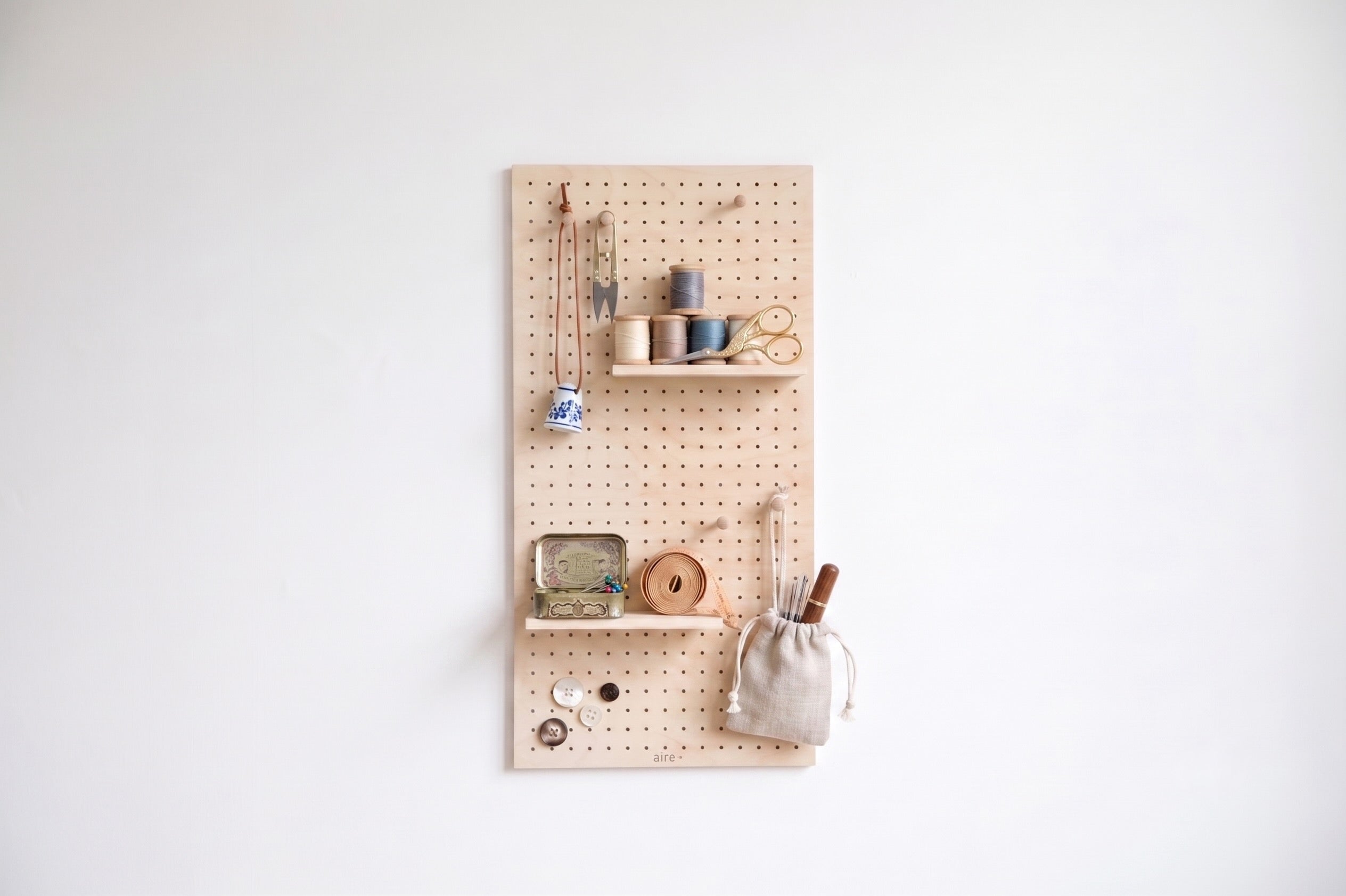 Pegboard aire organisant le matériel de couture