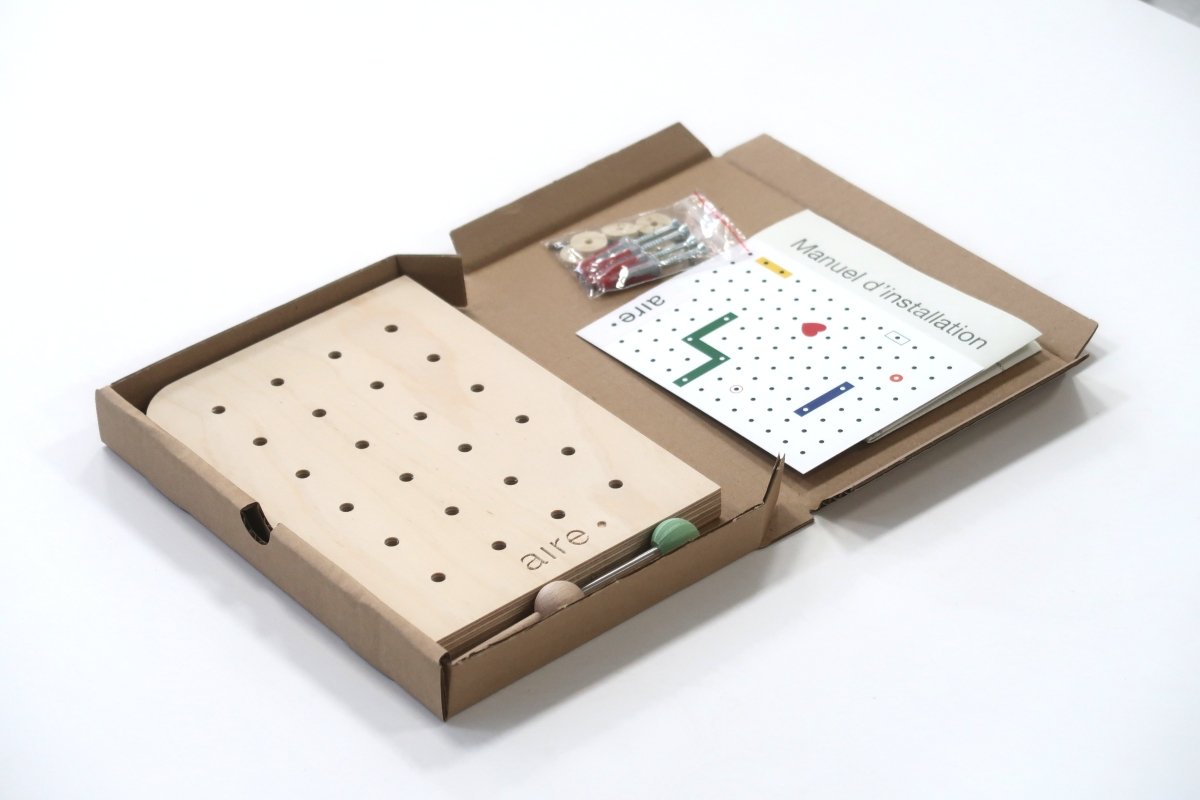 Échantillon pegboard Aire dans sa boîte avec manuel et goupilles
